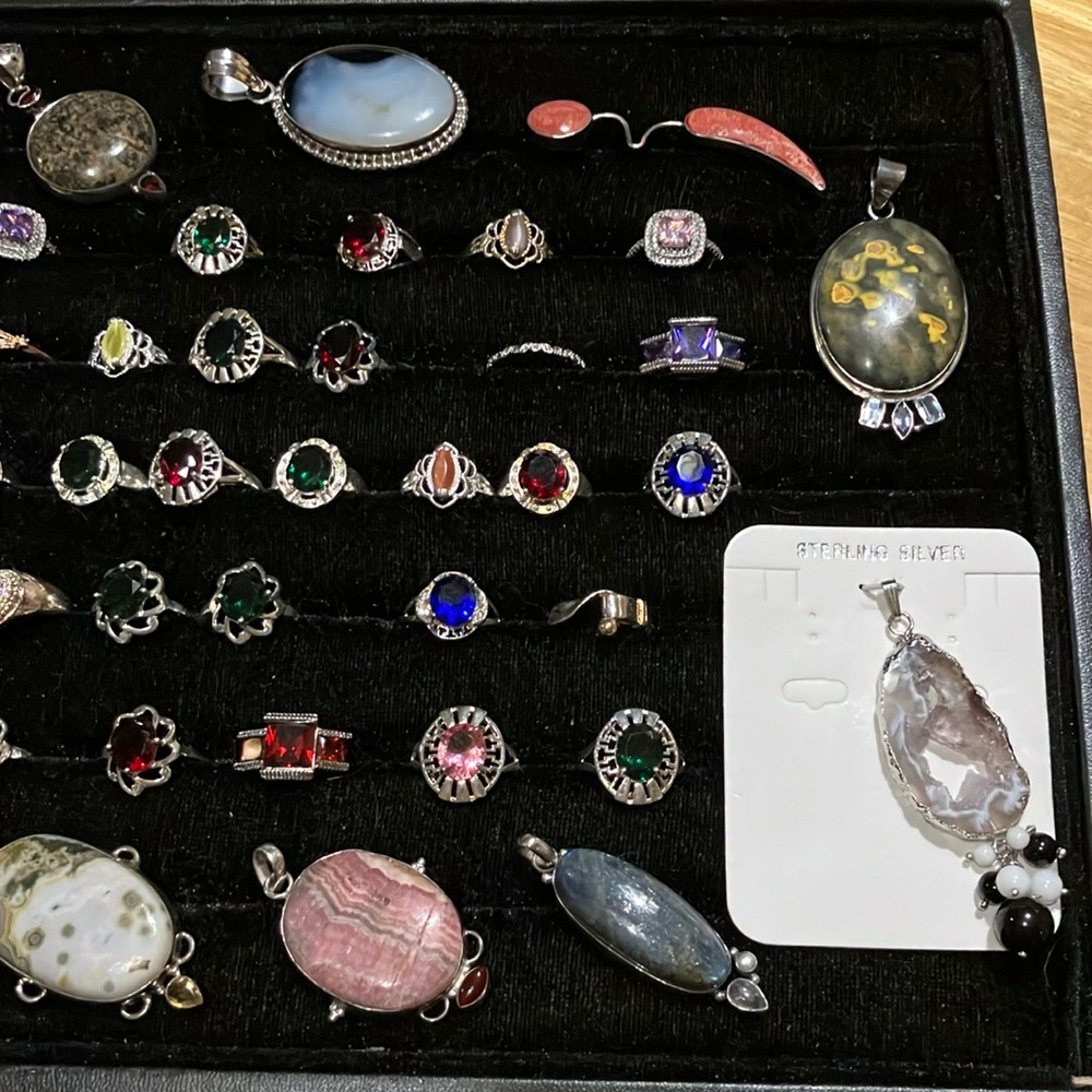 50 piece lot of beautiful jewelry, sterling silver rings, and pendants, 925